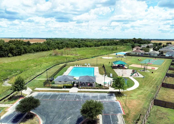 a view of a swimming pool and outdoor space