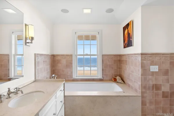 a bathroom with a sink and a bathtub