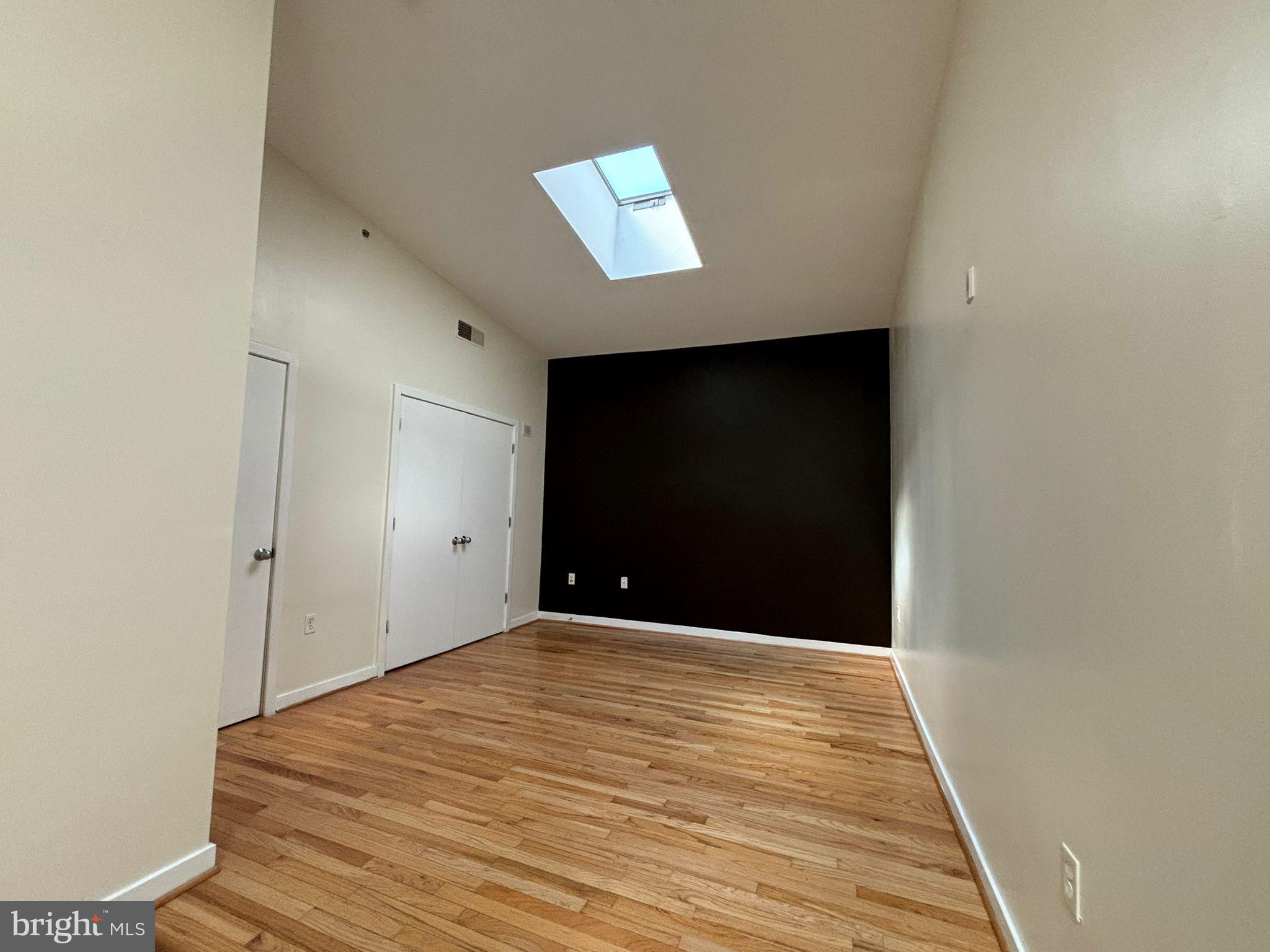 242 Centre Street, Unit 12 Trenton, NJ 08611 - Photo 19 of 23 a view of a hallway with wooden floor