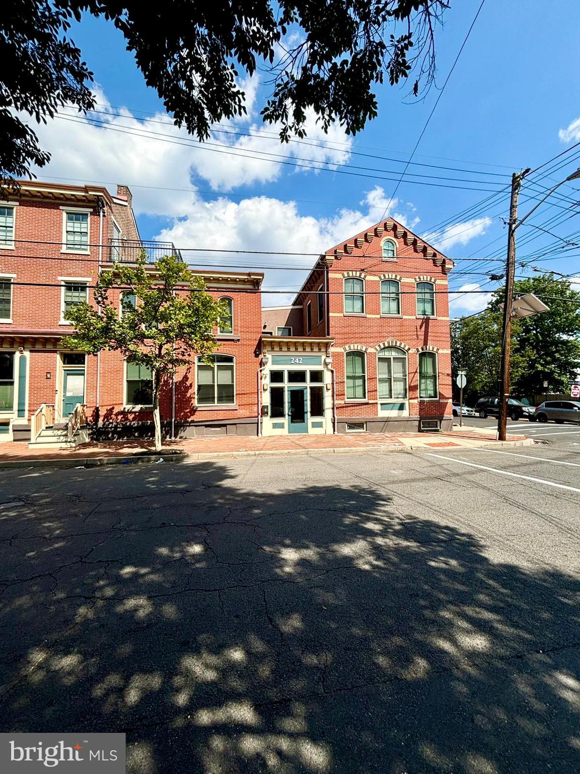 242 Centre Street, Unit 12 Trenton, NJ 08611 - Photo 2 of 23 a front view of a building