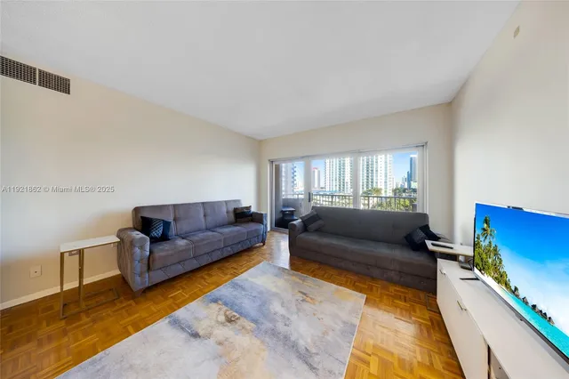 a living room with furniture and a couch