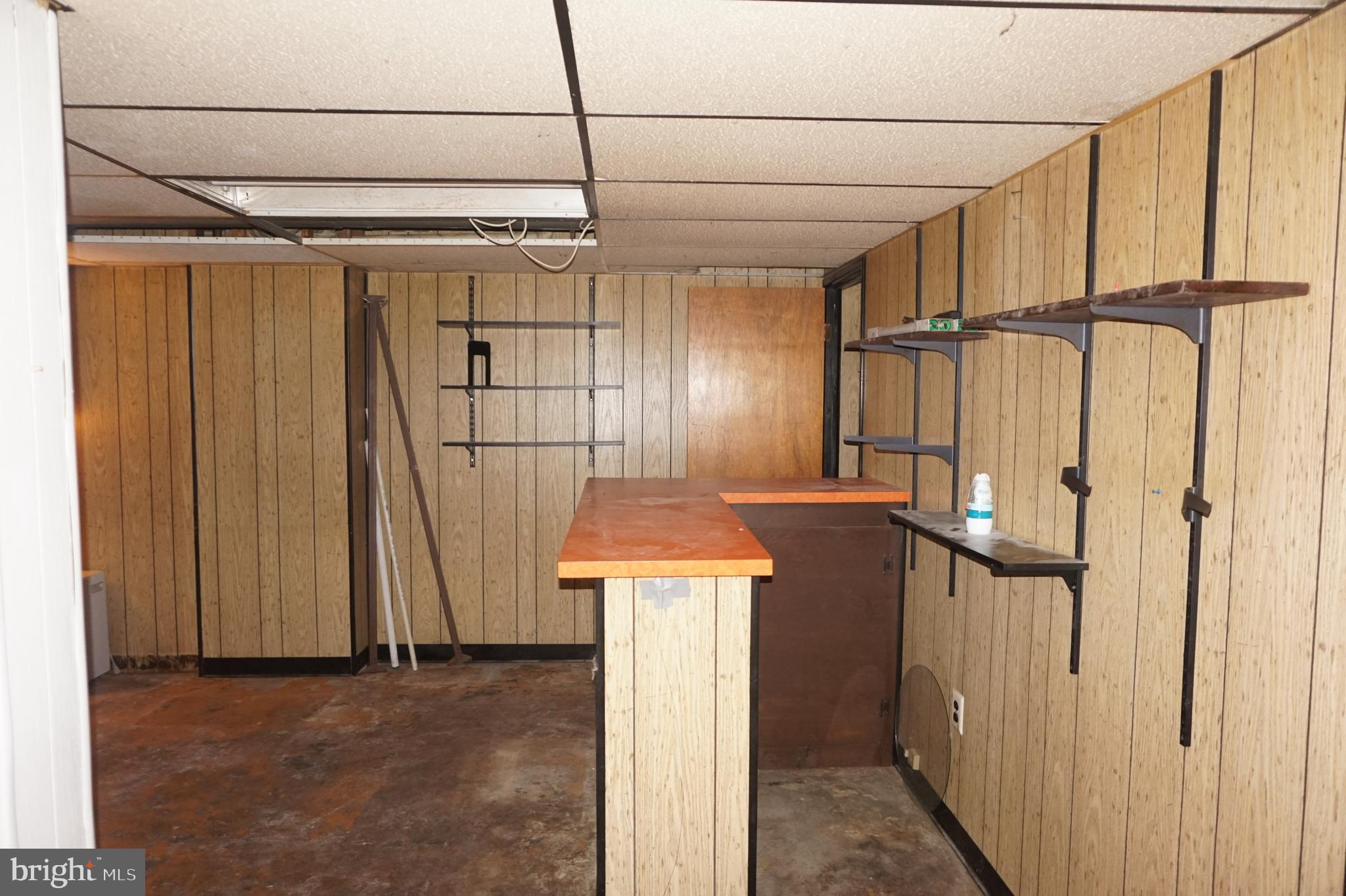15 Sullivan Avenue Bellmawr, NJ 08031 - Photo 14 of 17 a view of a storage & utility room with lots of racks