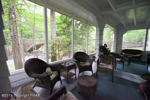 127 Piney Road Cresco, PA 18326 - Photo 15 of 47 View from Screened Porch