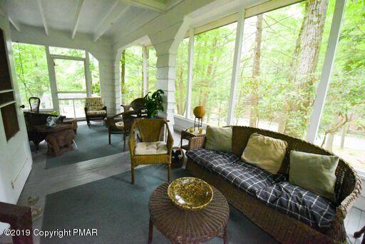 127 Piney Road Cresco, PA 18326 - Photo 16 of 47 Screened Porch
