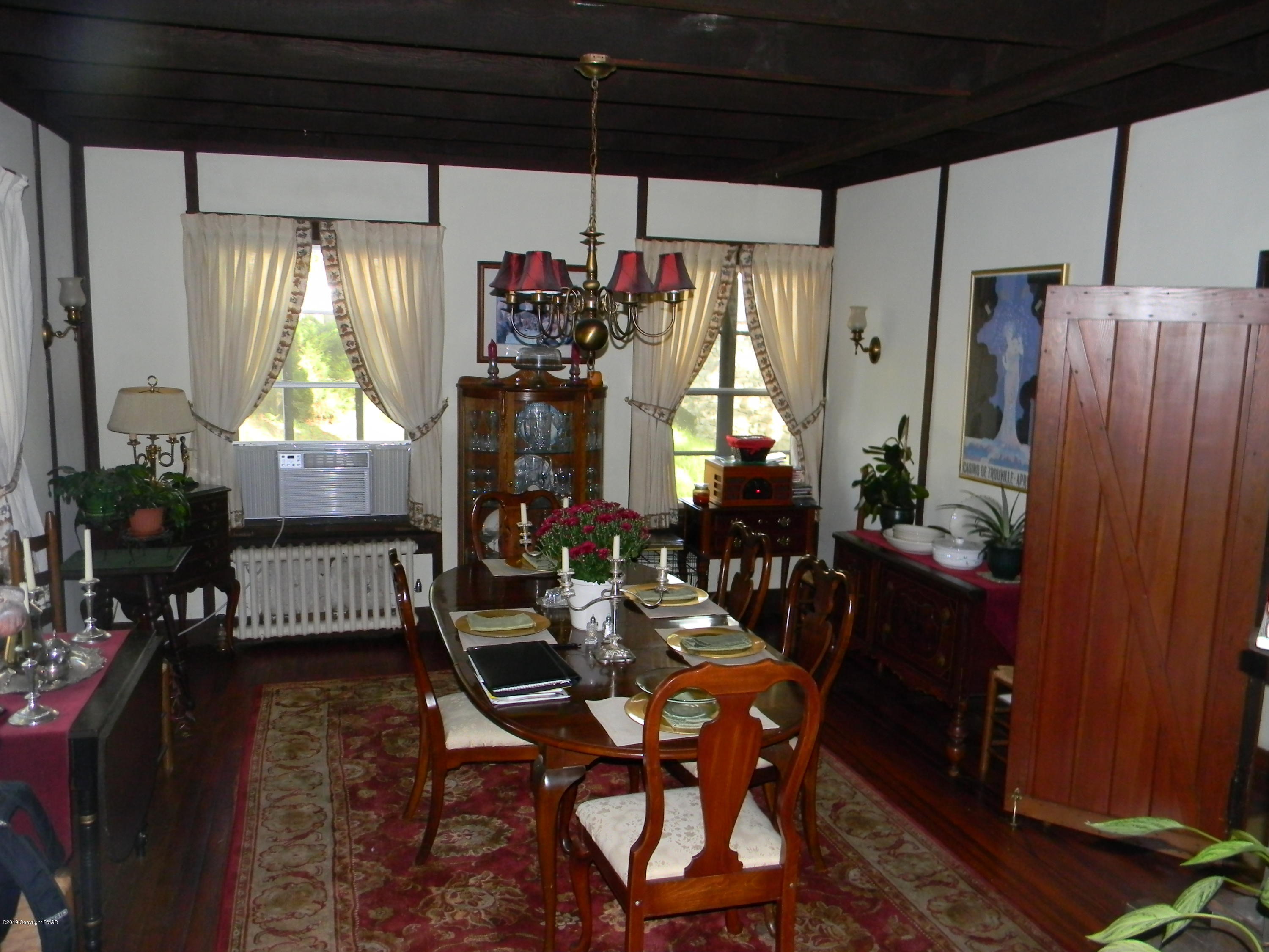 127 Piney Road Cresco, PA 18326 - Photo 25 of 47 Wall Scones in Dining Room