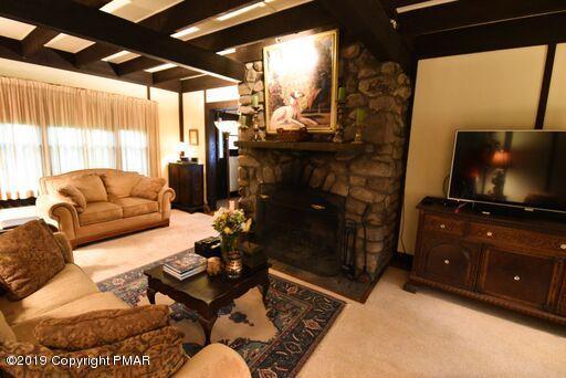 127 Piney Road Cresco, PA 18326 - Photo 7 of 47 Stone Fireplace in Living Room