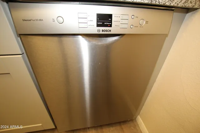 a view of a refrigerator in a kitchen