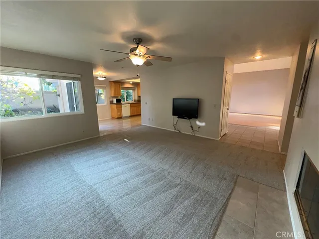 a view of livingroom with furniture window and front door