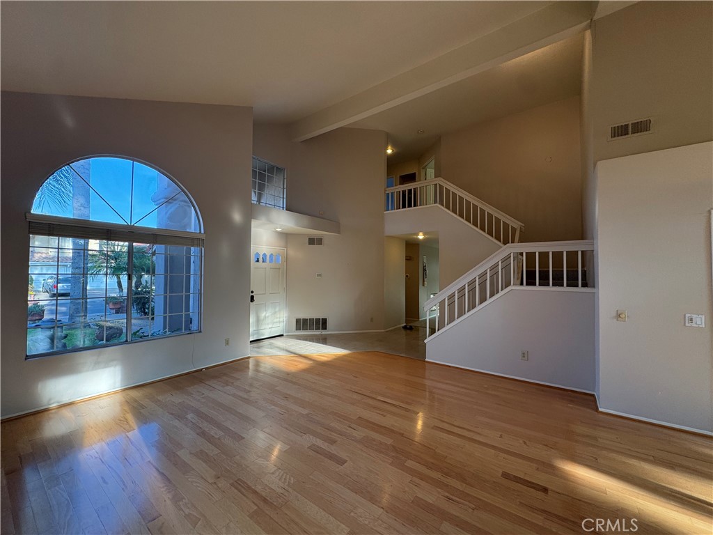 6 Fierro Irvine, CA 92614 - Photo 5 of 29 a view of entryway and hall with wooden floor
