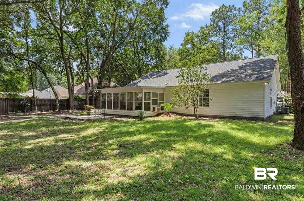 10251 Windmill Road Fairhope, AL 36532 - Photo 41 of 44 Back of property featuring a sunroom