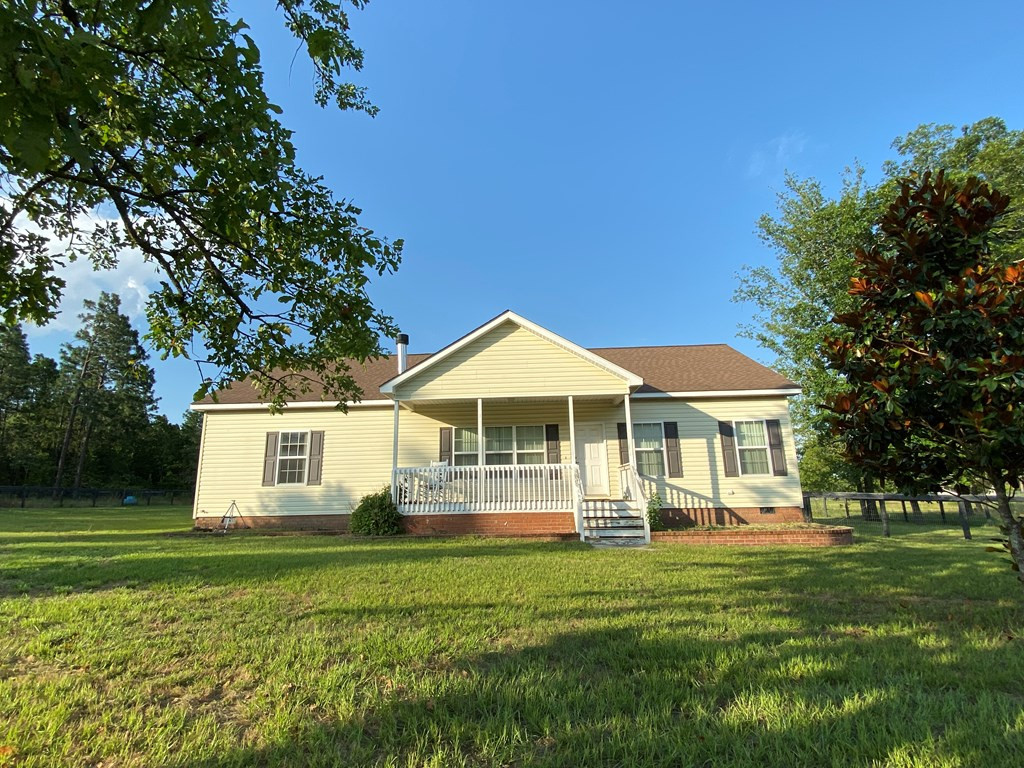 136 Britton Road Windsor, SC 29856 - Photo 40 of 60 a front view of a house with a yard