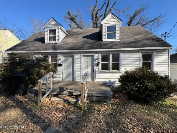a house view with a outdoor space