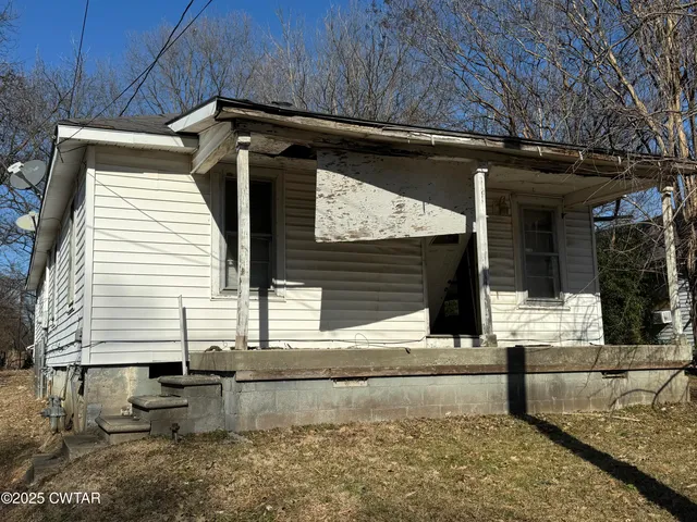 a view of house with outdoor space