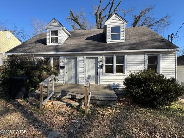 a house view with a outdoor space