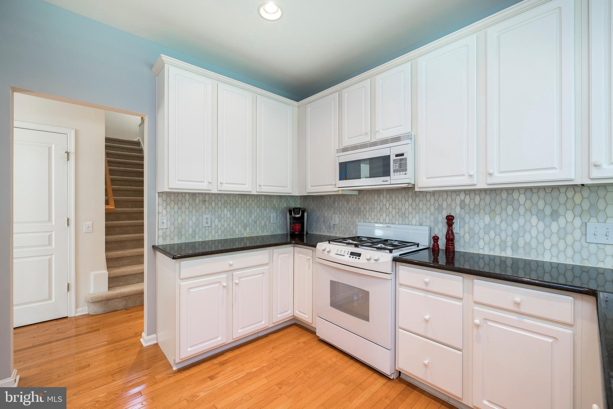 636 Churchill Road Chester Springs, PA 19425 - Photo 12 of 33 Sleek, Chic Kitchen with Designer Backsplash!
