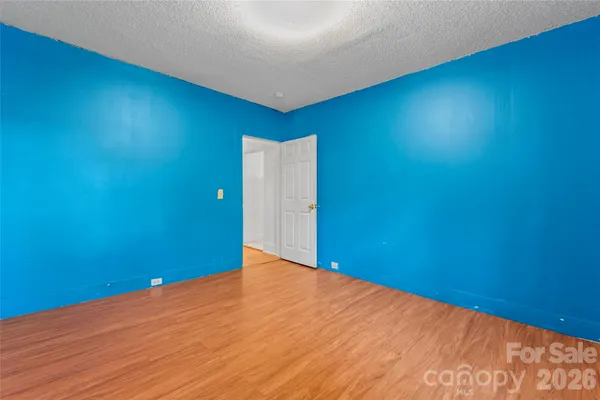 a view of a big room with wooden floor