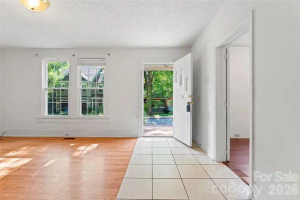 a view of empty room with windows