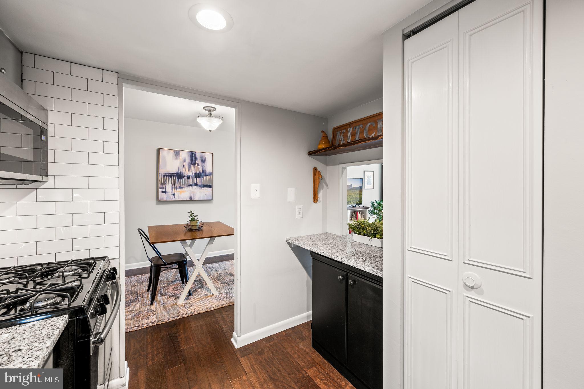 307 Old Forge Crossing Devon, PA 19333 - Photo 12 of 29 a workspace with wooden floor and furniture