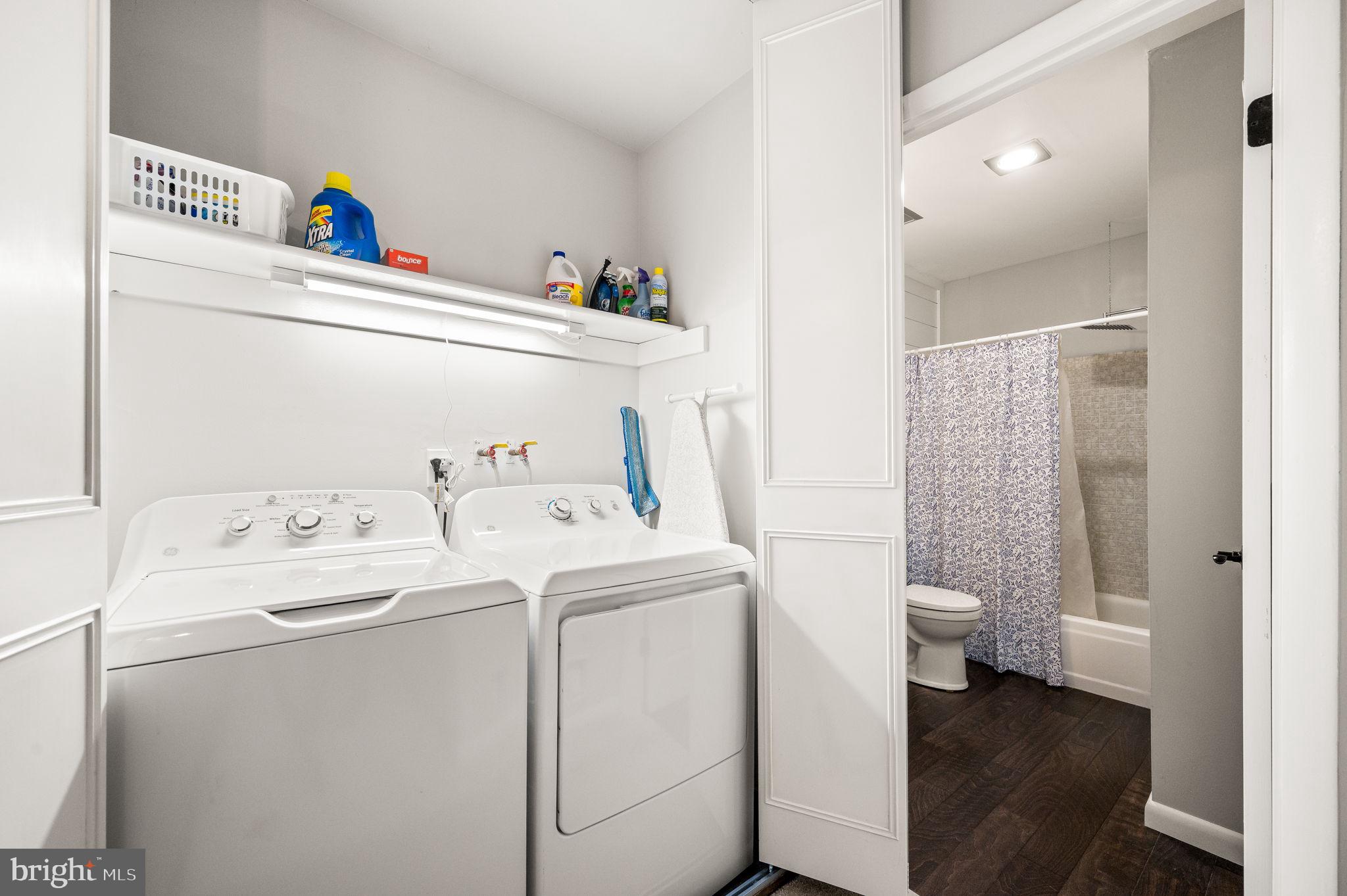 307 Old Forge Crossing Devon, PA 19333 - Photo 20 of 29 a utility room with dryer and washer