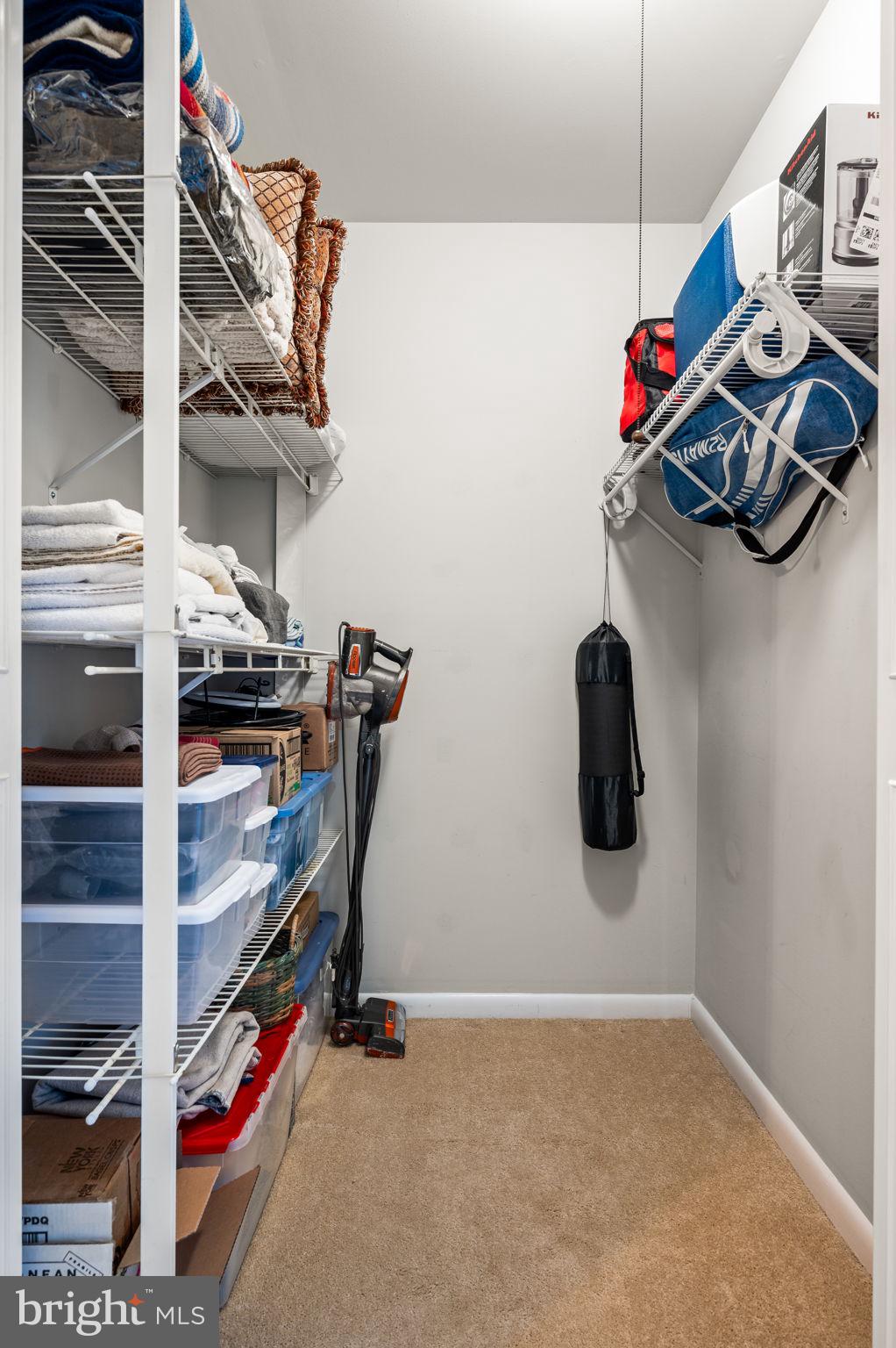 307 Old Forge Crossing Devon, PA 19333 - Photo 21 of 29 a view of walk in closet with clothes and shoes