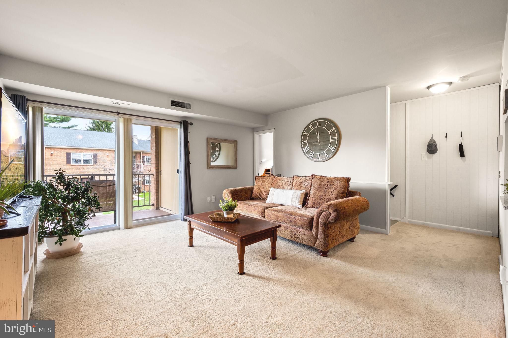 307 Old Forge Crossing Devon, PA 19333 - Photo 3 of 29 a living room with furniture and a large window