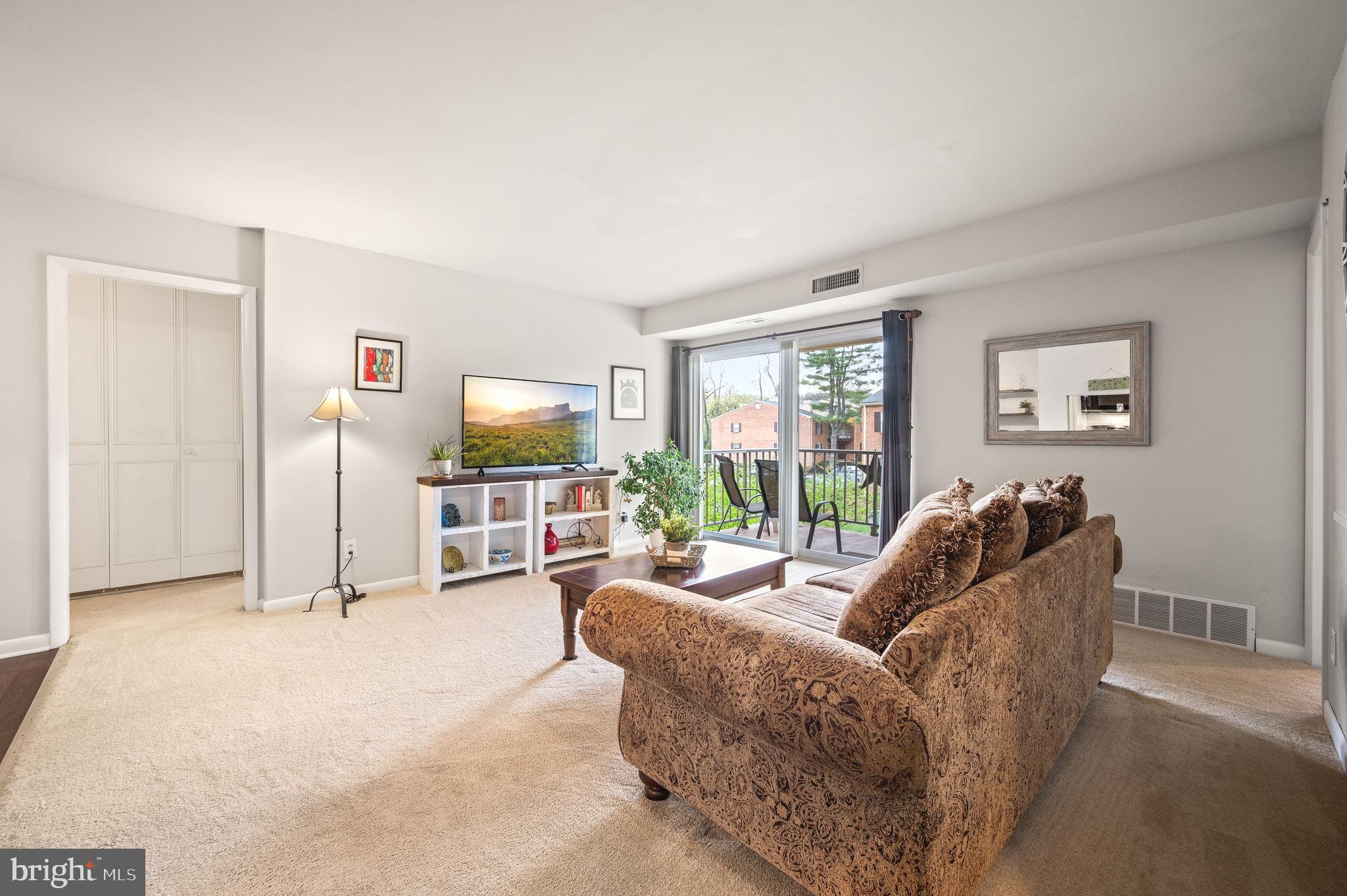 307 Old Forge Crossing Devon, PA 19333 - Photo 4 of 29 a living room with furniture and a flat screen tv