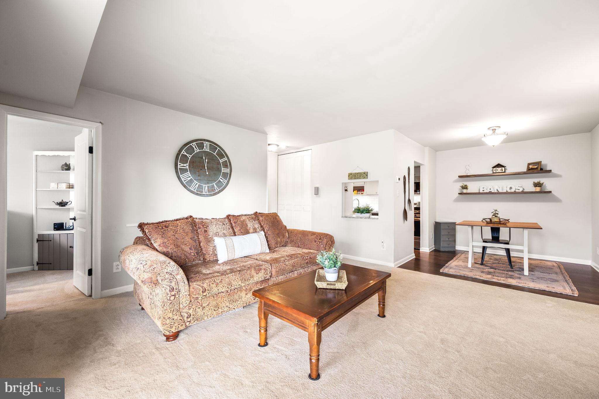 307 Old Forge Crossing Devon, PA 19333 - Photo 5 of 29 a living room with furniture and a table