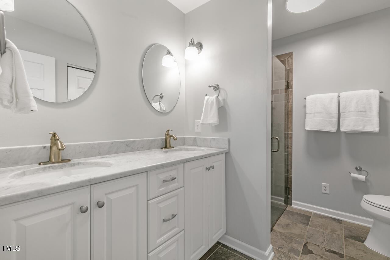 100 Queensferry Road Cary, NC 27511 - Photo 24 of 55 Primary Bathroom - Dual Sinks, Marble Counter