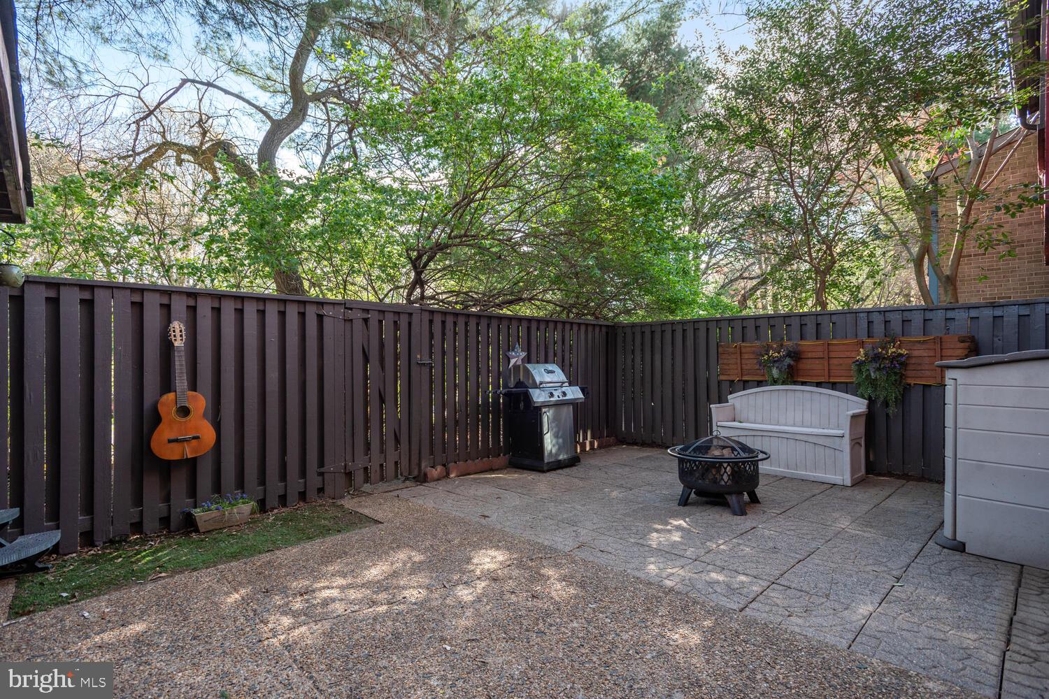 1753 Ivy Oak Square Reston, VA 20190 - Photo 14 of 27 Private backyard patio with shed storage.