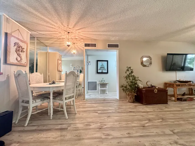 a view of a dining room with furniture