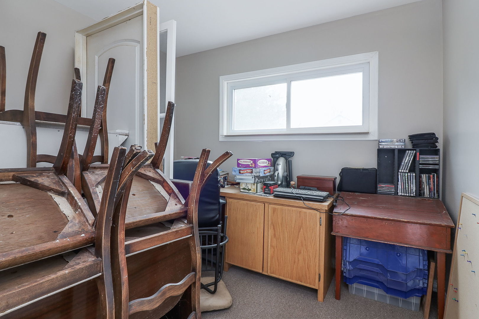 1222 Grove Street Aurora, IL 60505 - Photo 11 of 22 a view of a workspace with furniture and a window