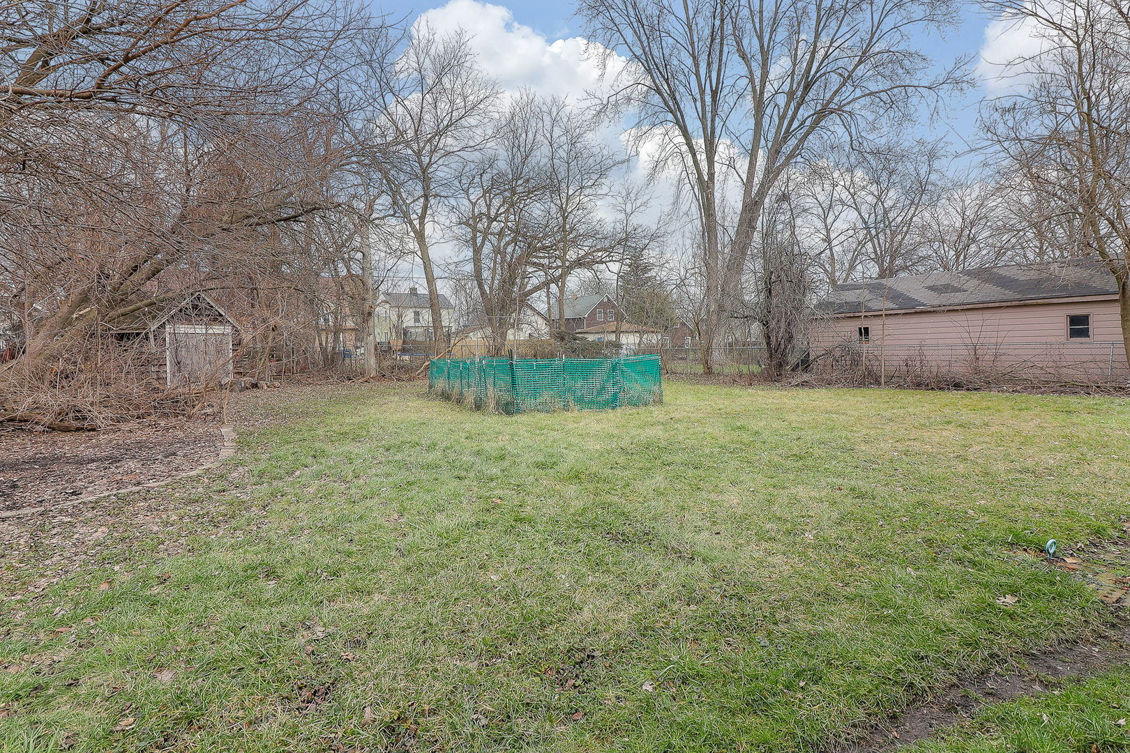 1222 Grove Street Aurora, IL 60505 - Photo 21 of 22 a view of a yard with a house
