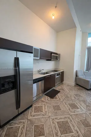 a bathroom with a sink a toilet and bathtub