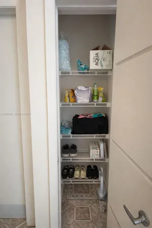 a view of a terrace with outdoor seating and city view