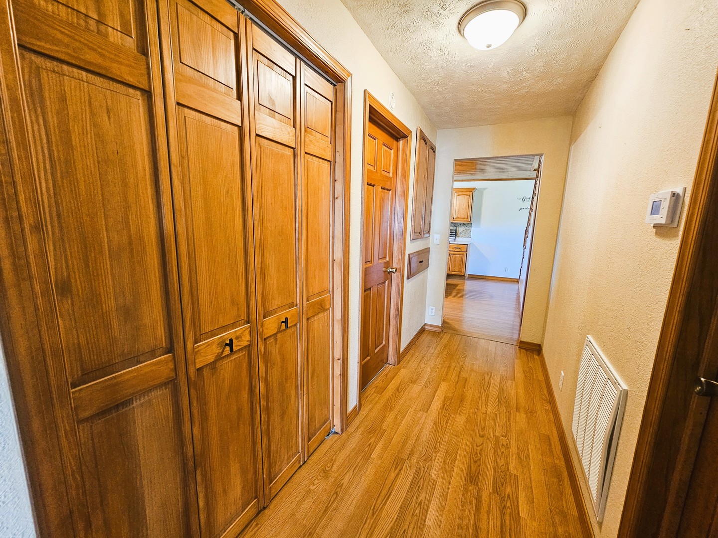 878 County Road 600N Sims, IL 62886 - Photo 19 of 39 a view of a hallway with wooden floor and staircase