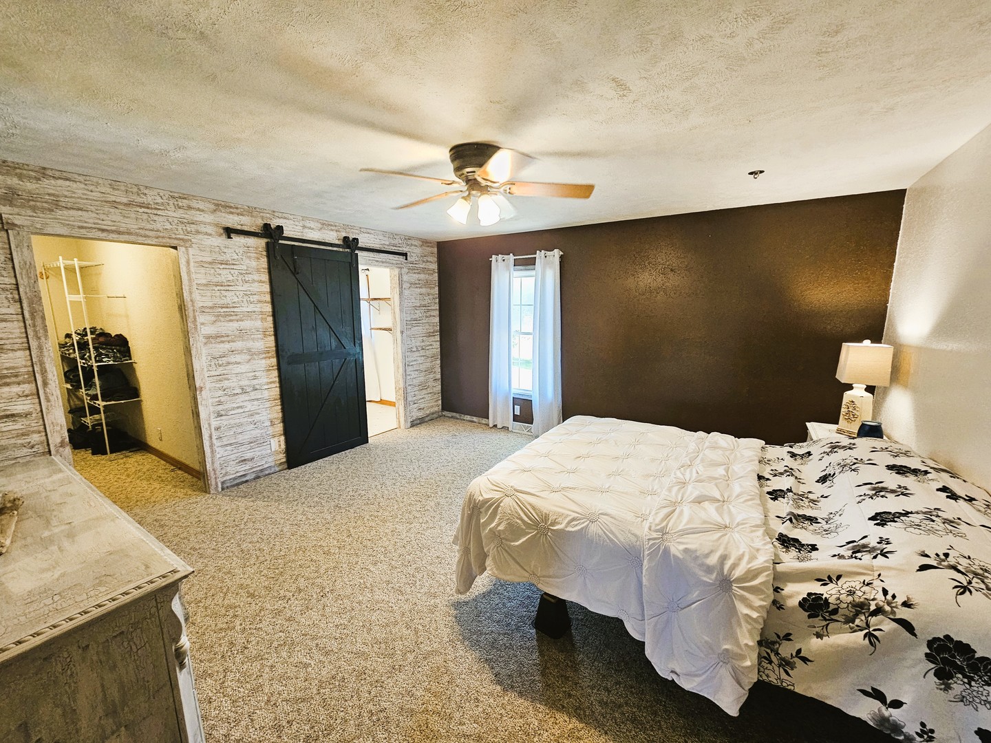 878 County Road 600N Sims, IL 62886 - Photo 25 of 39 a bedroom with a bed and a large mirror with dresser