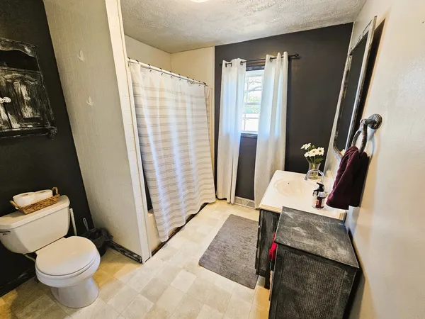 a bedroom with a bed and a closet