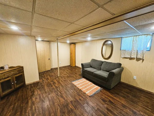 a room with furniture and a wooden floor