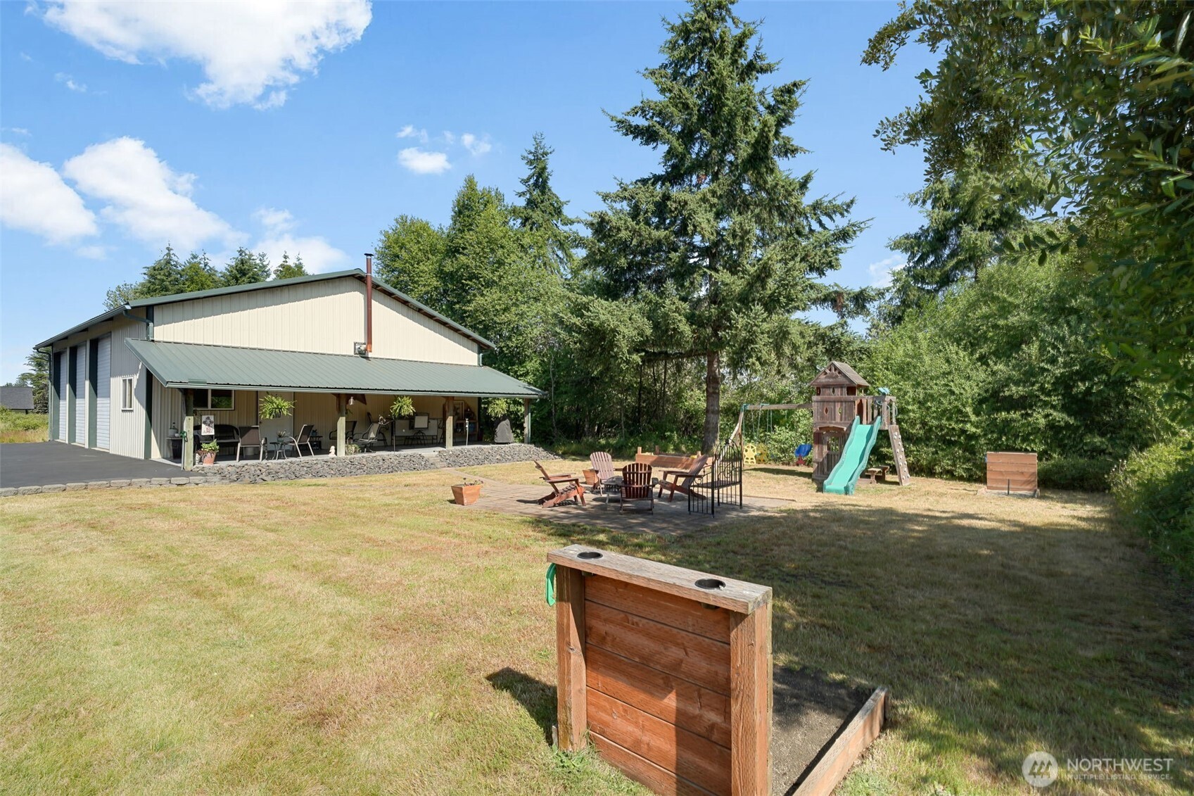 109 Bowers Road Chehalis, WA 98532 - Photo 3 of 38 a view of a house with pool and chairs