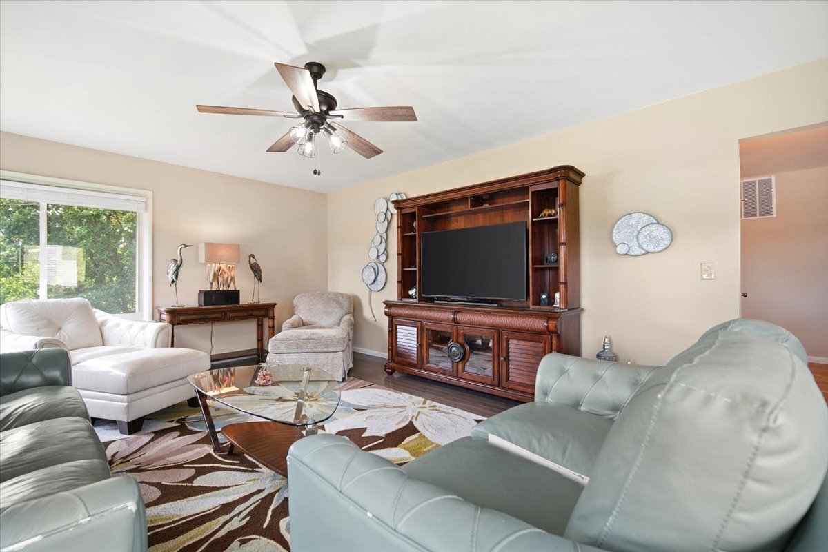 203 Highview Drive Eureka, IL 61530 - Photo 6 of 49 a living room with furniture and a flat screen tv