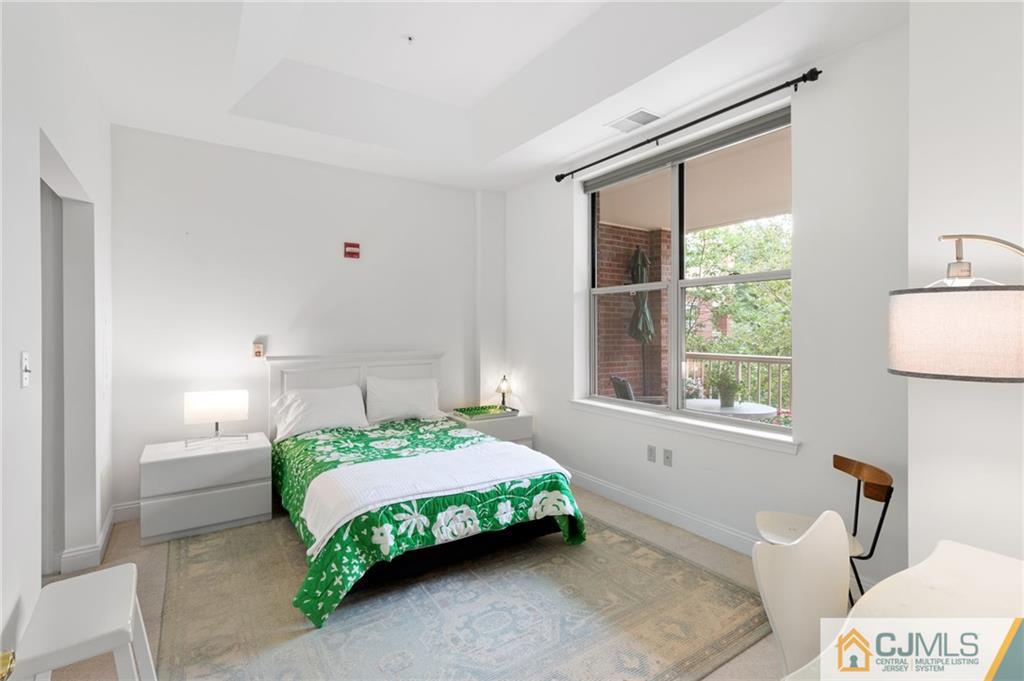 2126 Windrow Drive Plainsboro, NJ 08540 - Photo 11 of 32 a bedroom with a bed and a window