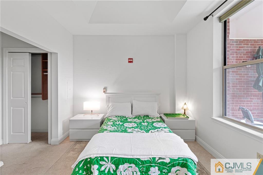 2126 Windrow Drive Plainsboro, NJ 08540 - Photo 12 of 32 a front view of a house with a yard and garage