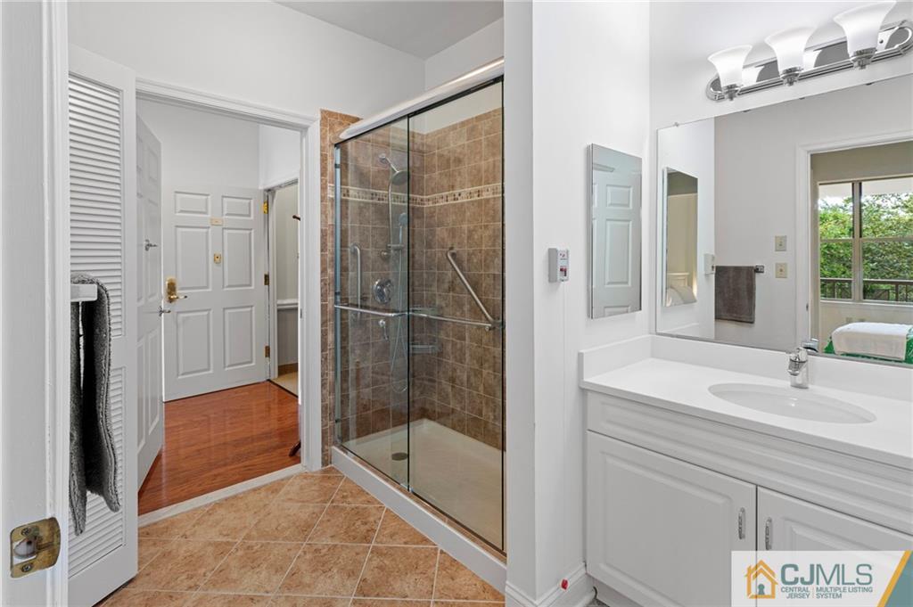 2126 Windrow Drive Plainsboro, NJ 08540 - Photo 15 of 32 a bathroom with a shower and a sink