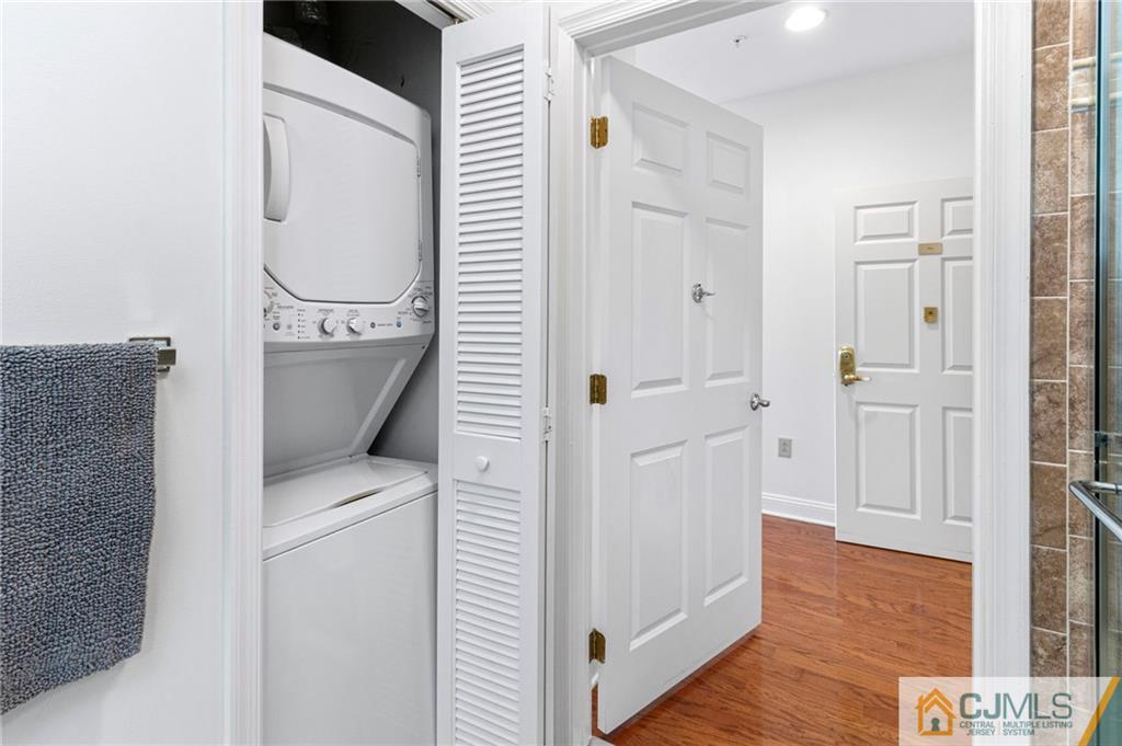 2126 Windrow Drive Plainsboro, NJ 08540 - Photo 16 of 32 a view of bathroom with a toilet a sink and a mirror
