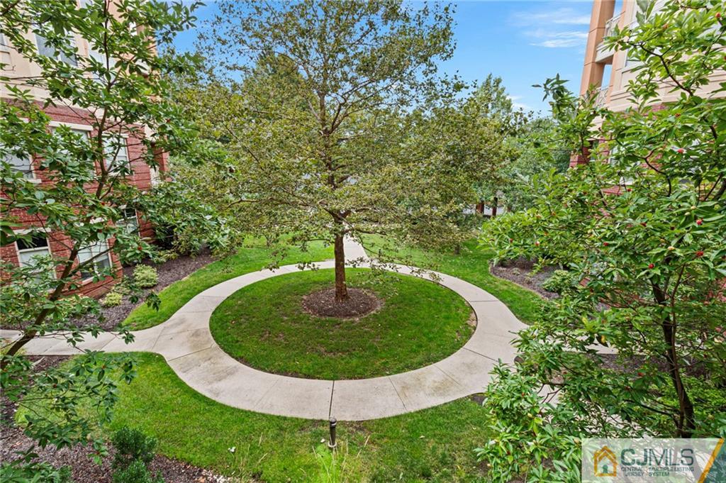 2126 Windrow Drive Plainsboro, NJ 08540 - Photo 18 of 32 a view of a fountain in the garden