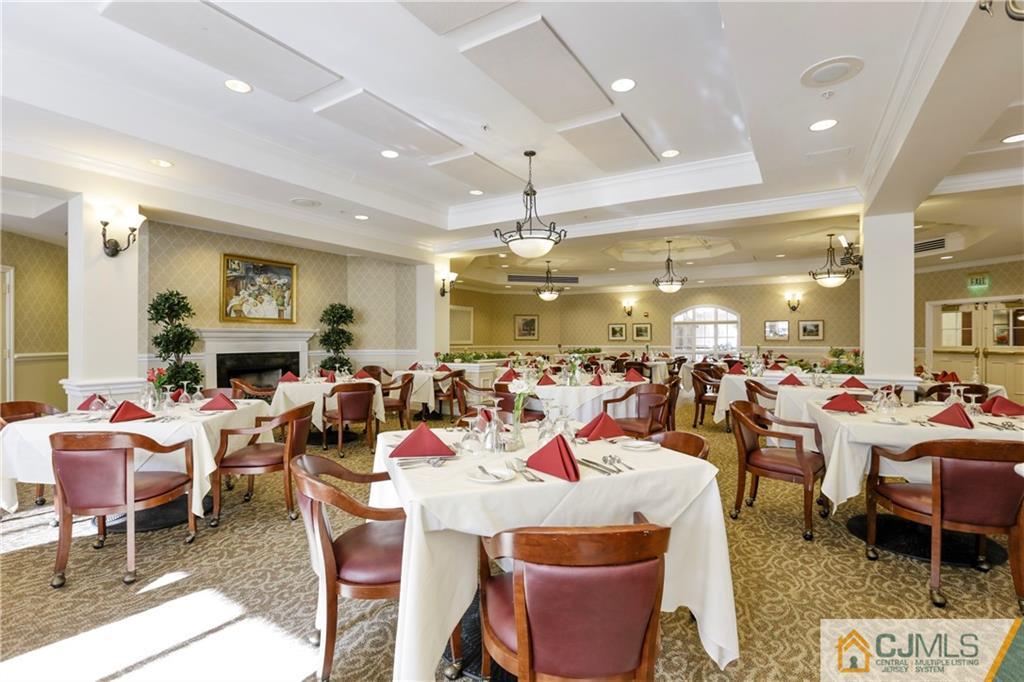 2126 Windrow Drive Plainsboro, NJ 08540 - Photo 26 of 32 a living room with lots of furniture and kitchen view