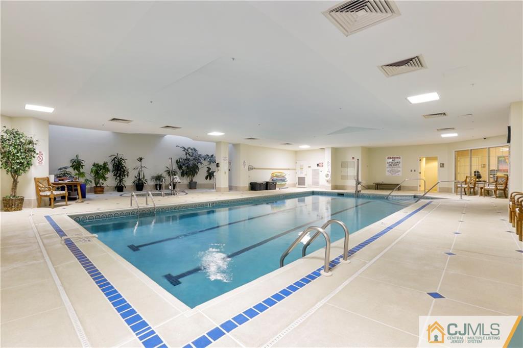 2126 Windrow Drive Plainsboro, NJ 08540 - Photo 28 of 32 a view of a living room and kitchen