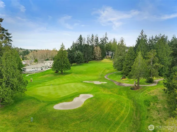 a view of a golf course with a garden