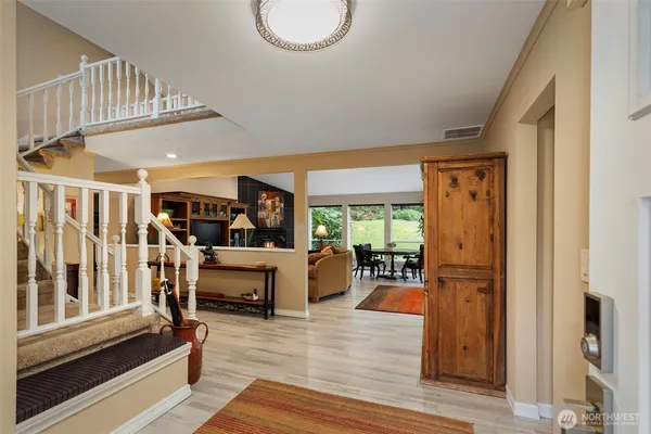 a view of living room and dining room