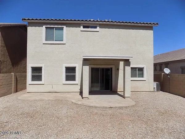 a view of a house with a garage